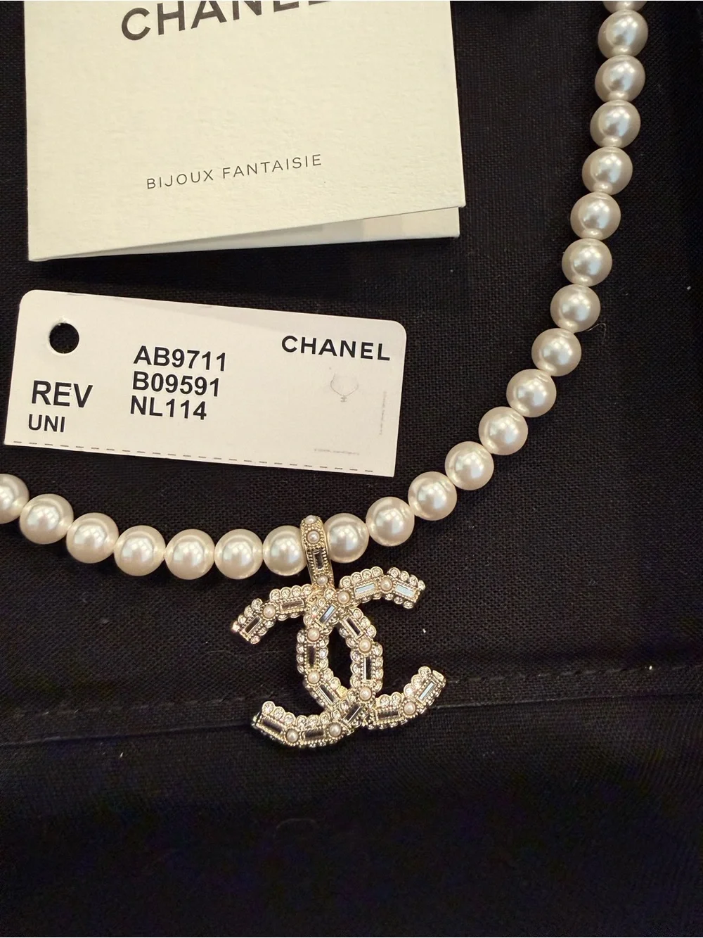 CHANEL Pearl Necklace with Crystal-Studded CC Pendant - White & silver